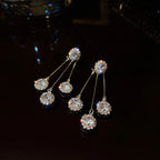 Tertia Honoria Shimmering Earrings